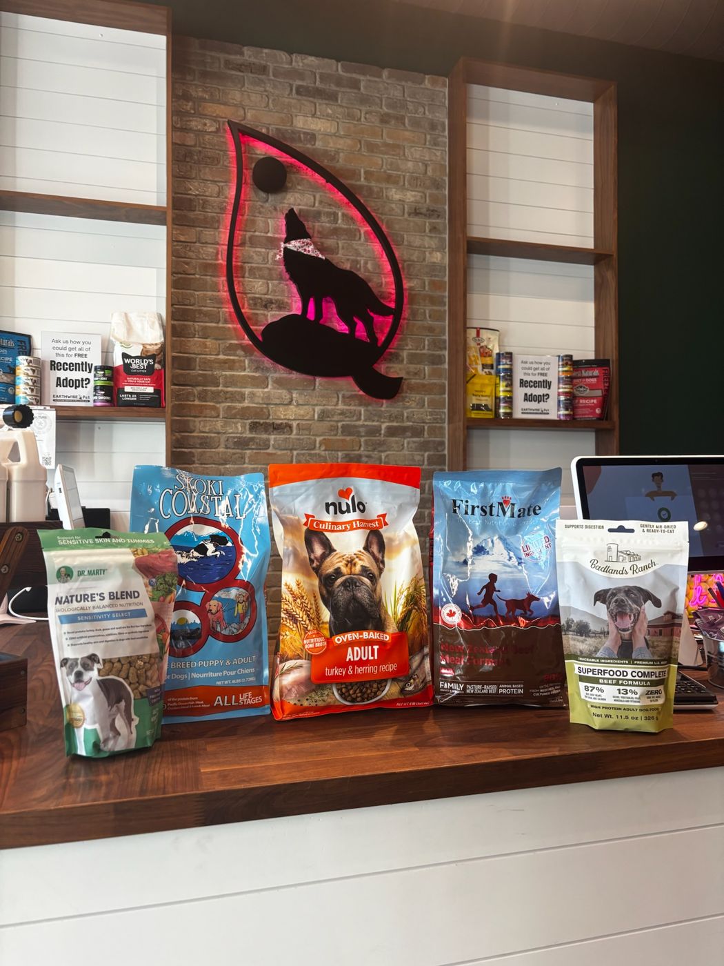 Bags of natural dog food on the counter at Earthwise Pet South Lamar